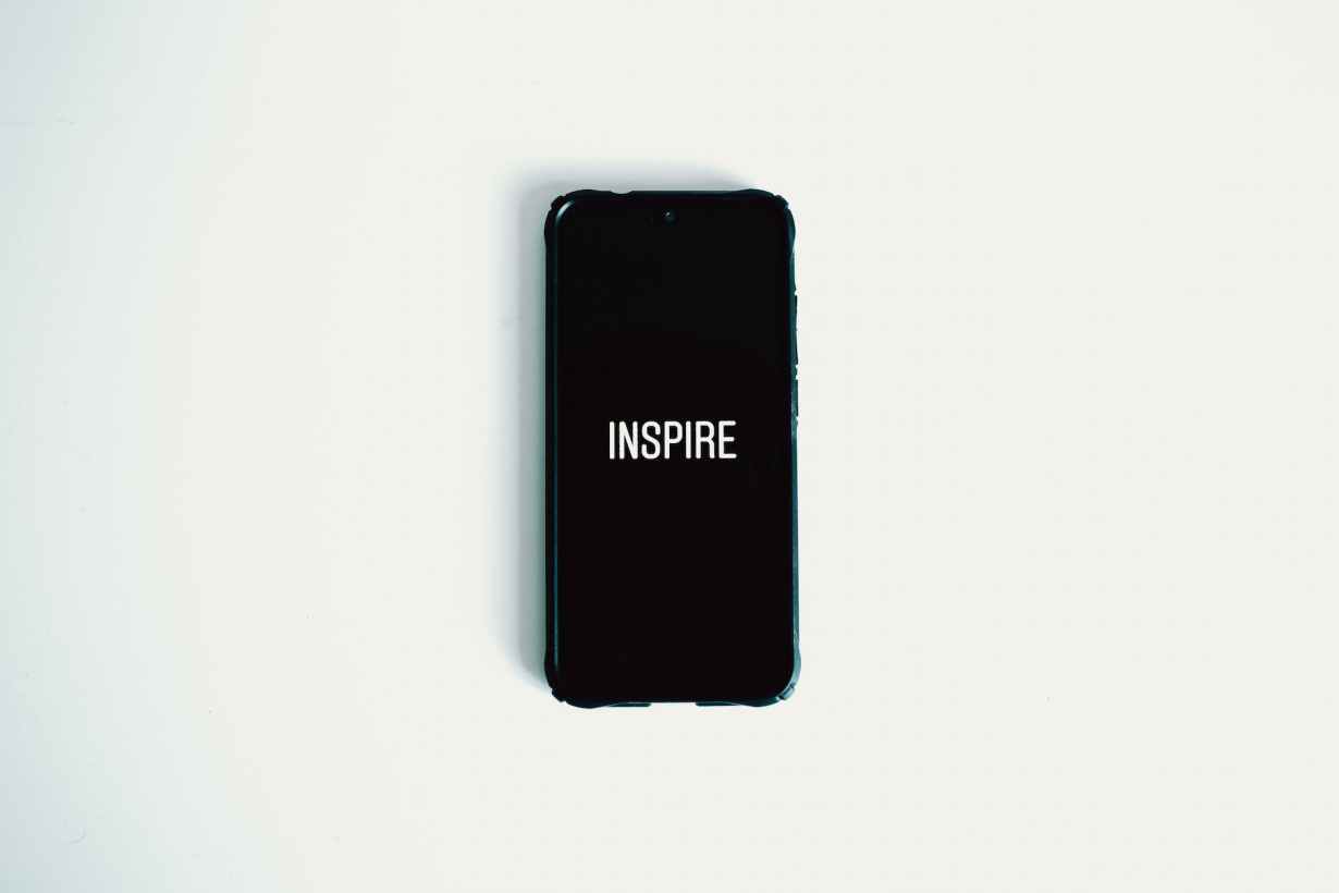 photo of black smartphone against white background